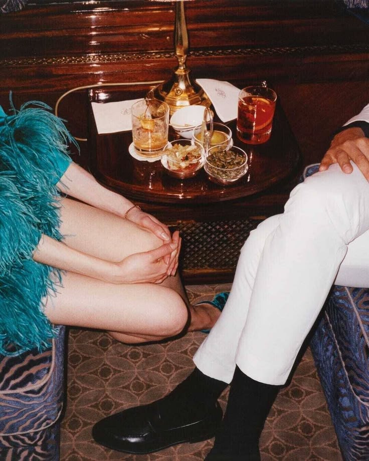 Guests in a richly appointed private lounge